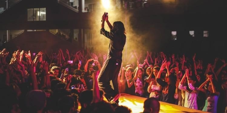 How to Fund Your Music Career - Sell your merch to fans at every opportunity. Especially after live shows!