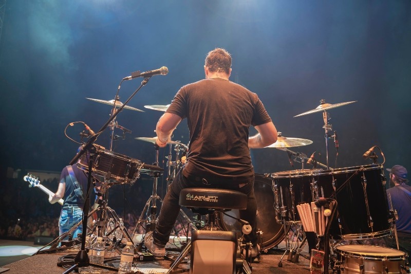Top 10 Drumming Techniques to Level Up Your Career - Drummer playing live
