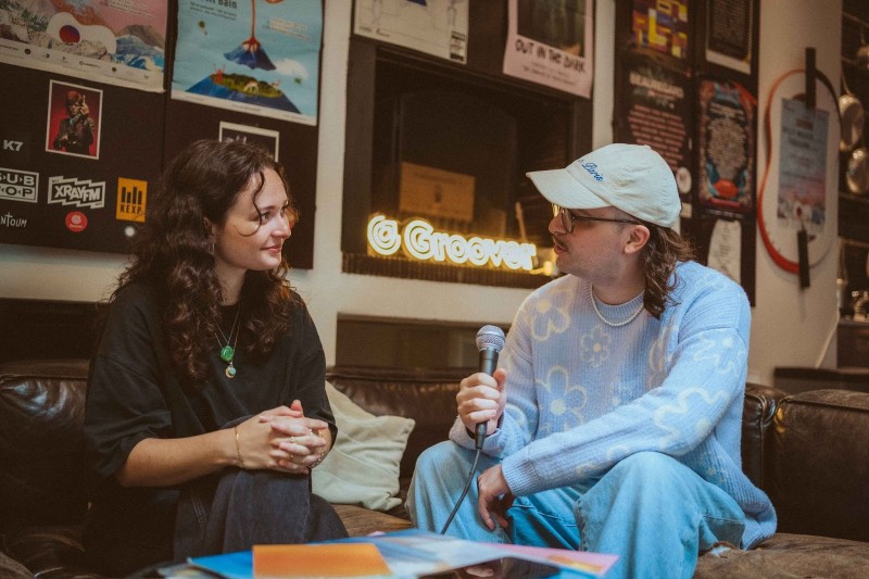 4 Steps to Secure Artist Interviews - artist being interviewed