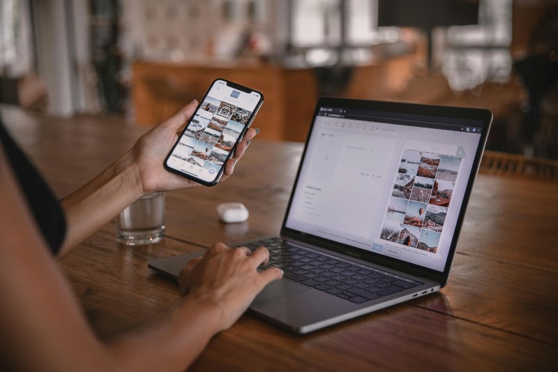 How to Land on Top Music Charts - person using social media