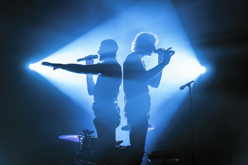 Spotify Countdown Pages: How to Hype Up Your Releases - Musicians on stage together